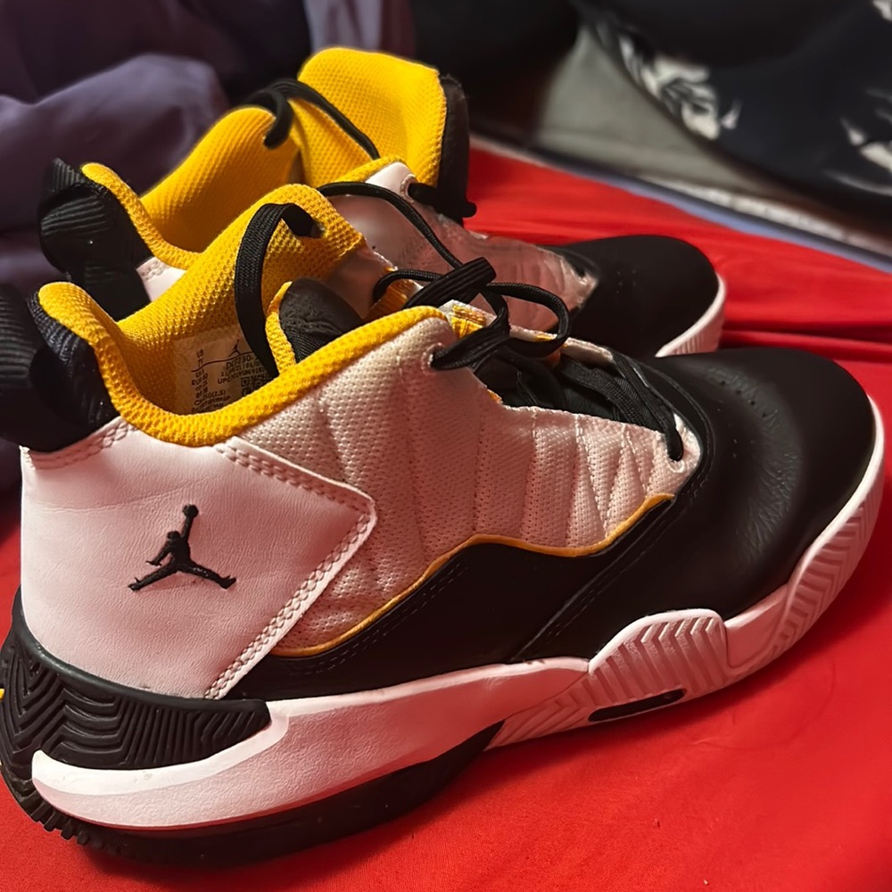 yellow and black jordan’s